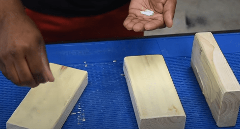 Image of sprinkling salt on wood